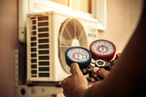 Professional Hvac technician working in Needham, MA